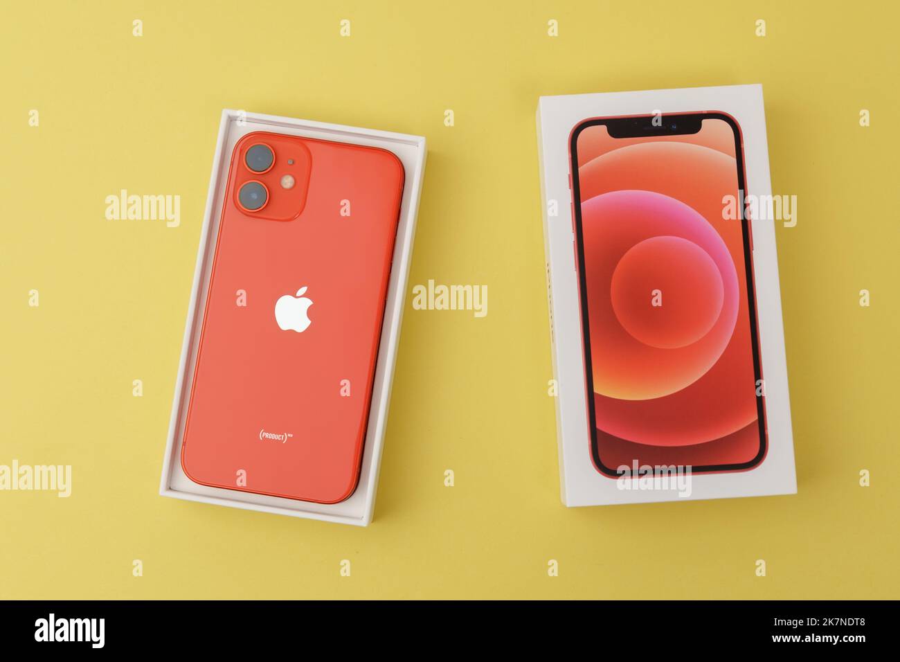 Tyumen, Russia-July 18, 2022: iPhone 12 mini product red. This mobile phone records 4k video in Dolby Atmos HDR Stock Photo