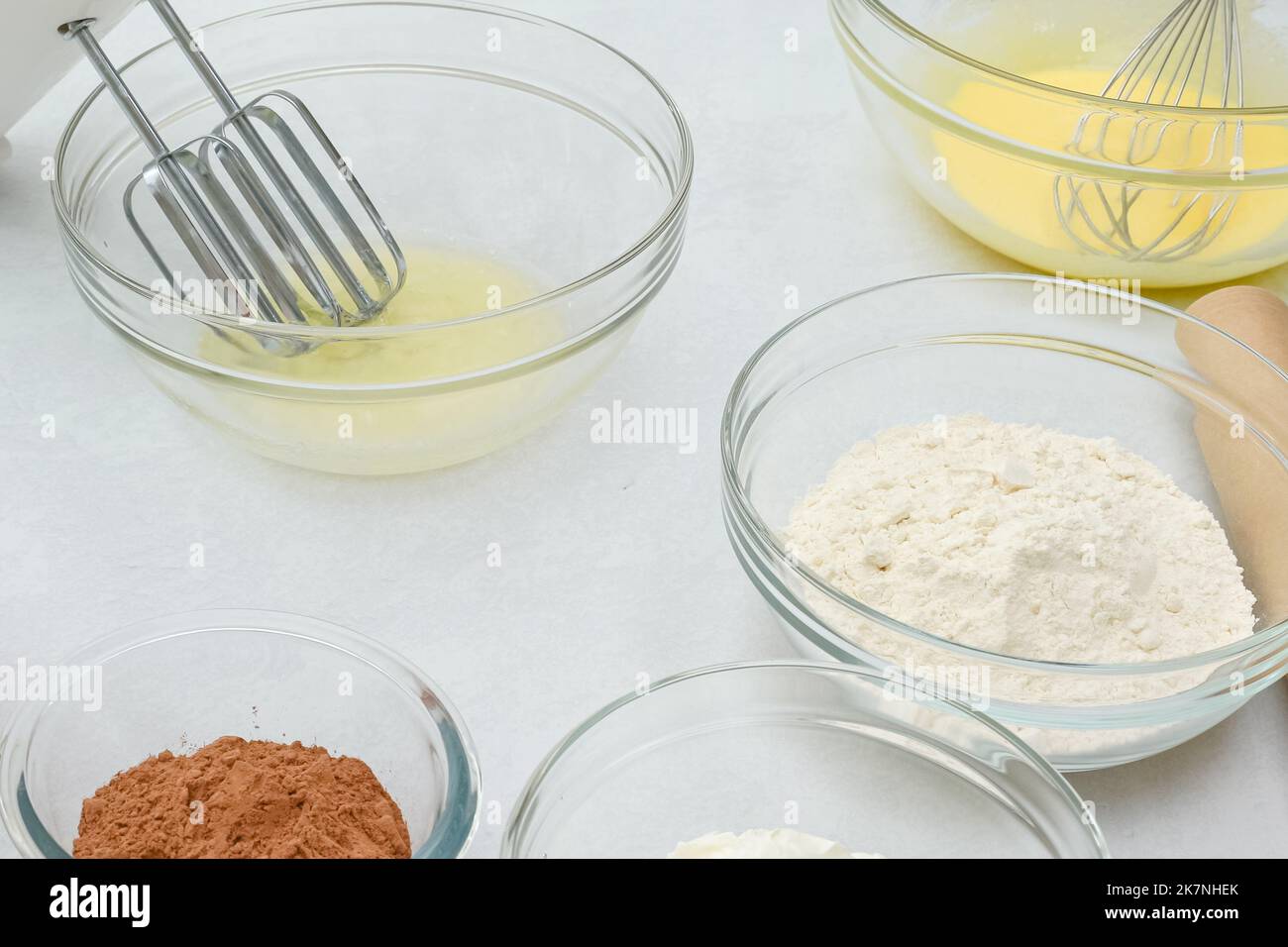 Making chocolate cake. Step by step recipe, ingredients close up on kitchen table Stock Photo