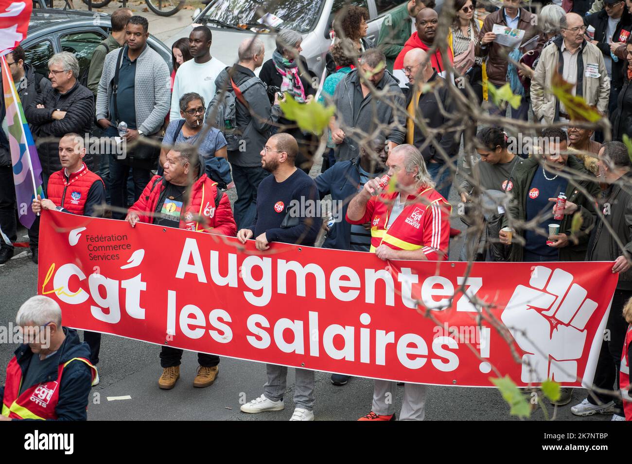 Paris, France, 18th October, 2022. Demonstrators march with banners during a national day of strike and protests for higher wages - Jacques Julien/Alamy Live News Stock Photo