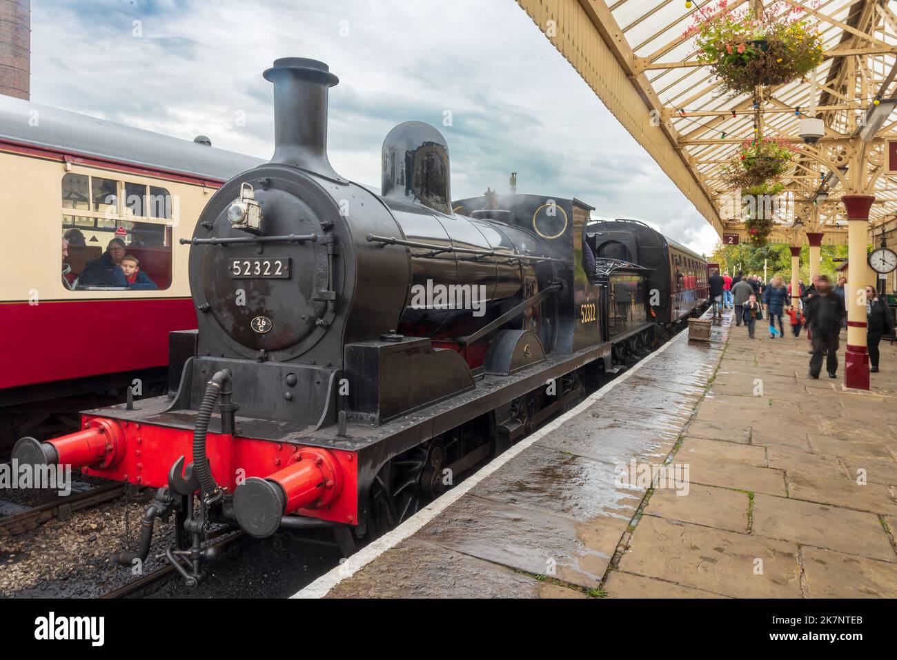 The Lancashire and Yorkshire Railway Class 27 0-6-0 steam locomotive seen at Ramsbottom station head for Rawtenstall during the autumn steam gala. Stock Photo