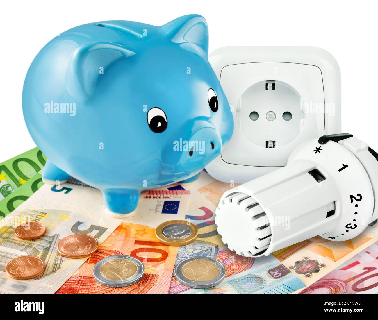 Energie und blaues Sparschwein mit Euro,  Heizungsthermostat und Steckdose Stock Photo