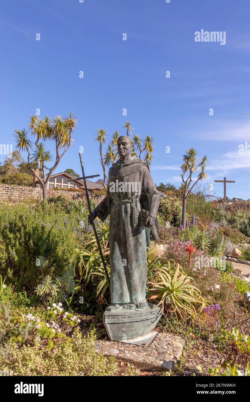 Carmel, USA - March 15, 2019: Bronze Statue of Saint Father Junipero Serra in the Gardens of the Carmel Mission Basiclia in Carmel, California , USA. Stock Photo