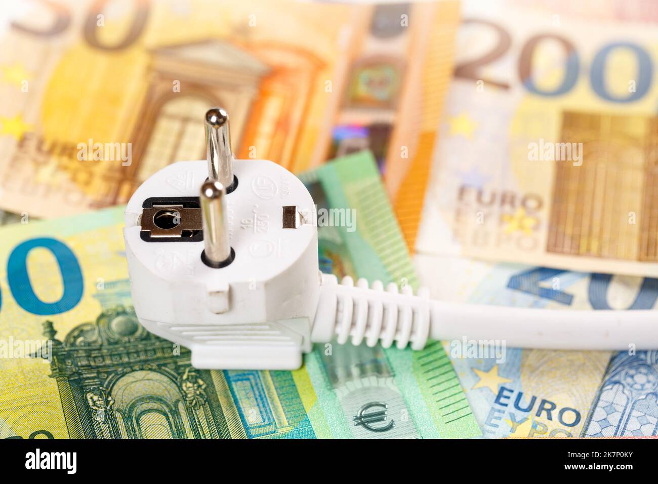 Cost of energy price of electricity symbolic photo with power cord mains cable line Stock Photo