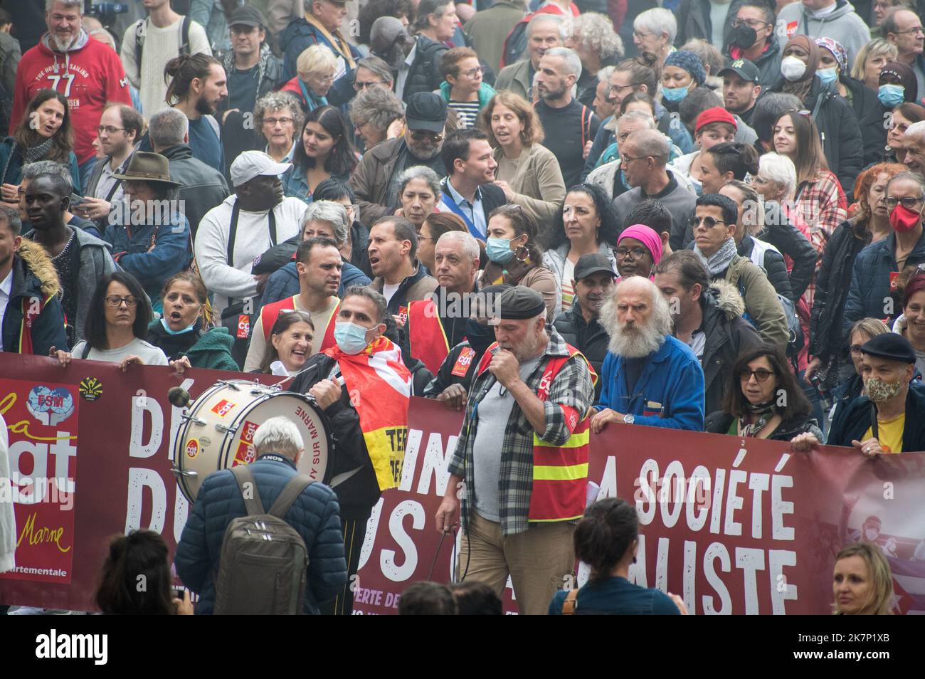 Paris, France, 18th October, 2022. Demonstrators march with banner during a national day of strike and protests for higher wages - Jacques Julien/Alamy Live News Stock Photo