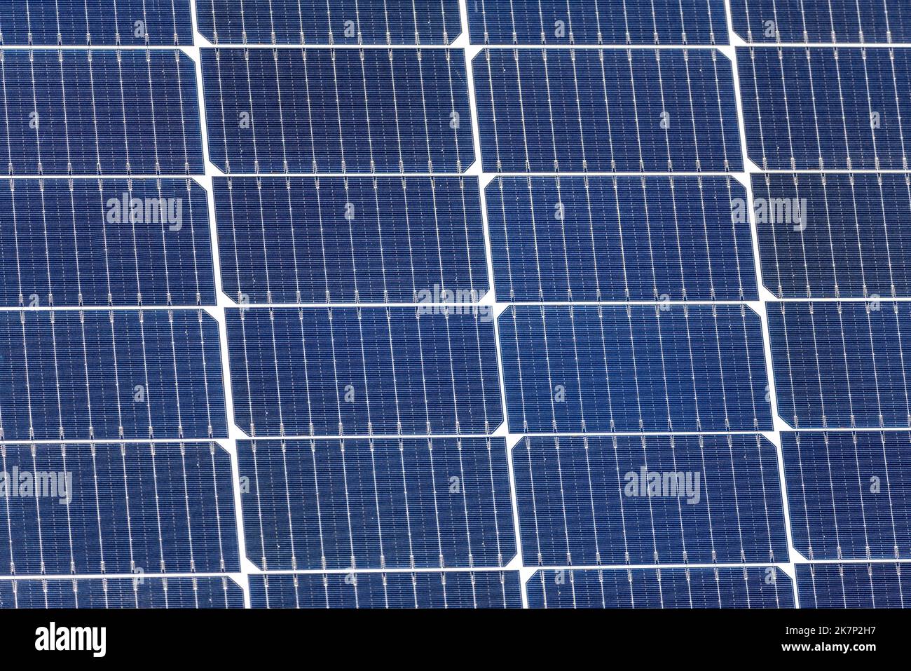 symmetrical cells of a solar panel that are repeated lengthwise and widthwise Stock Photo