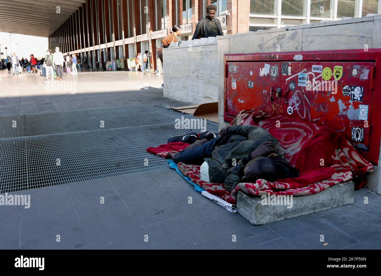 Rome, Italy. 18th Oct, 2022. A man sleeps near the entrance of Termini ...