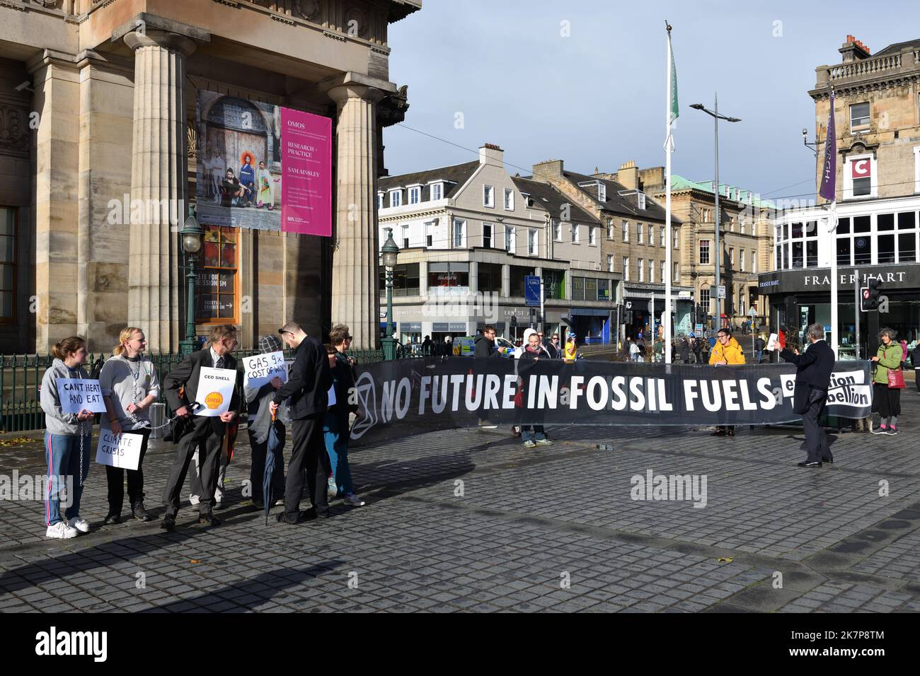 A protest group against the future use of fossil fuels gather in Edinburgh city centre, Scotland on the 1st October, 2022. Stock Photo