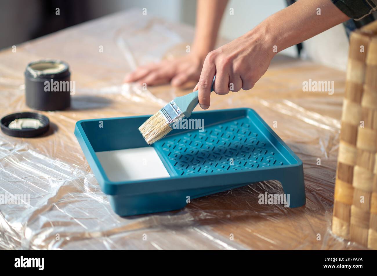 Craftsperson getting ready for painting a wooden box Stock Photo Alamy