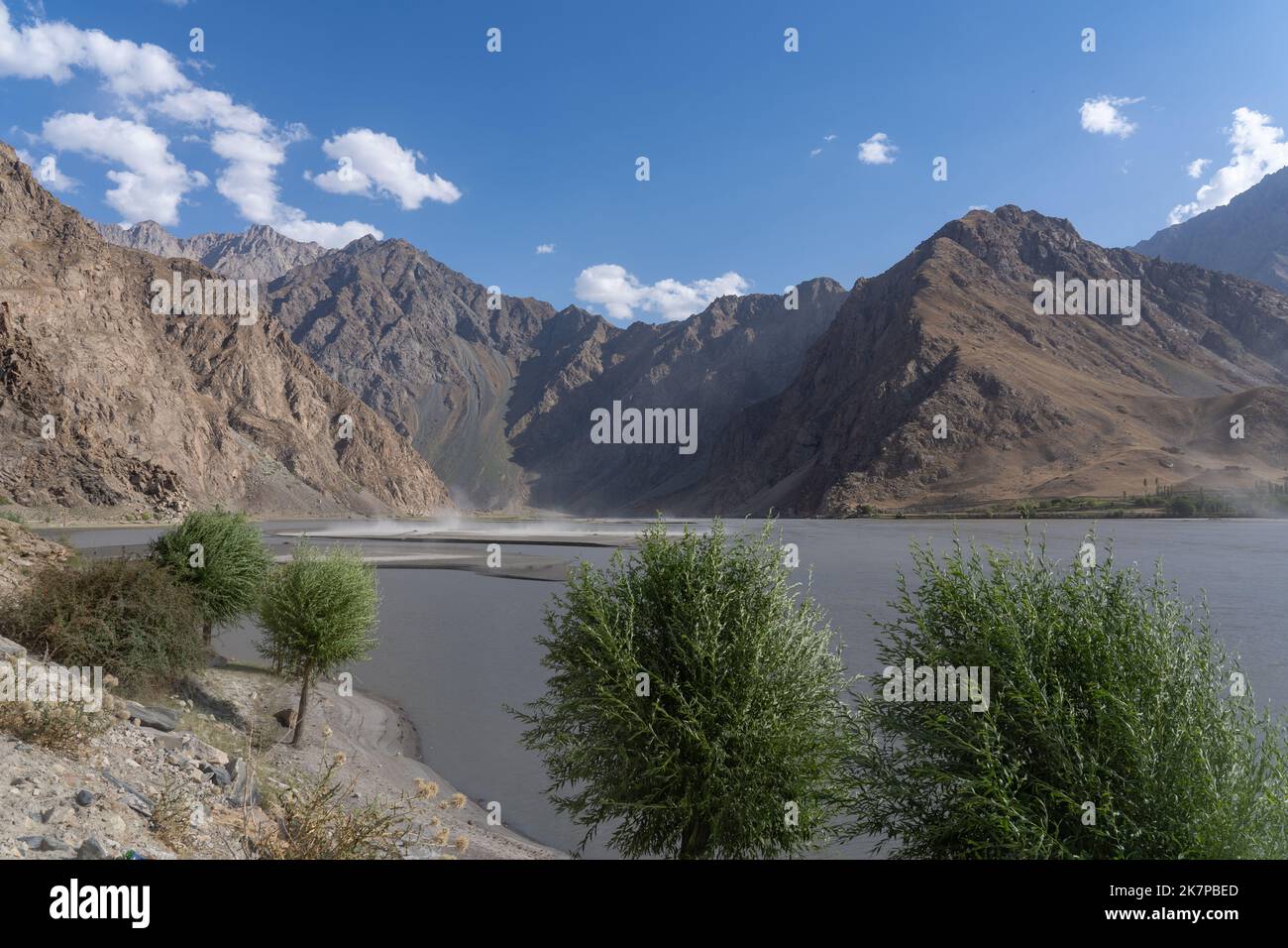 Landscape view of Panj river valley, border between Tajikistan and Afghanistan near Khorog in mountainous Gorno-Badakshan, Tajikistan Pamir Stock Photo