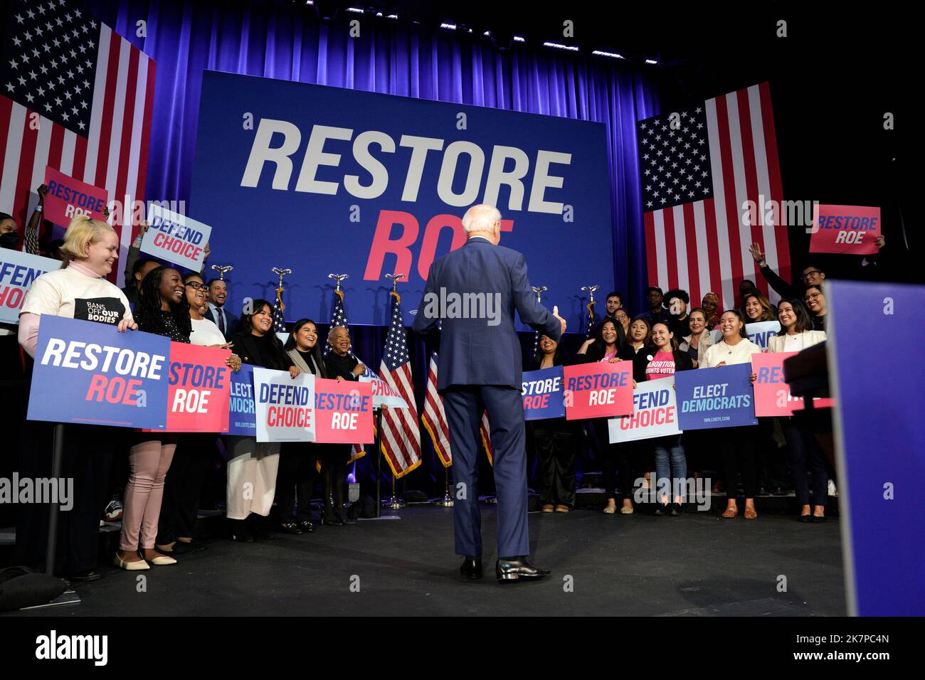 U.S. President Joe Biden greets the audience before delivering remarks ...