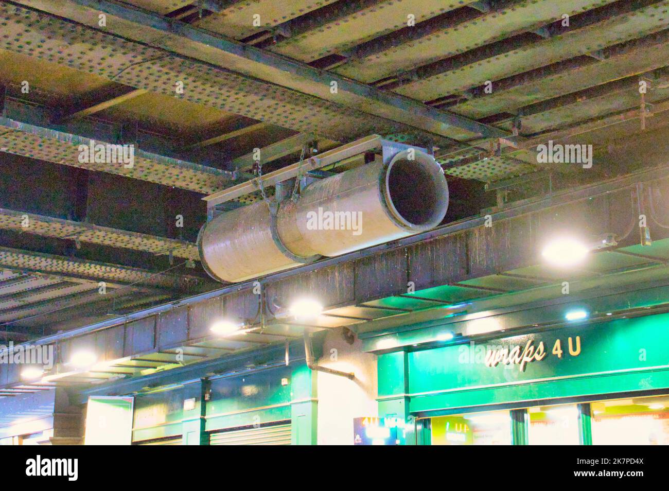 air pollution control unit under highlanders heilanders  umbrella bridge spanning argyle street  Glasgow Central Station Stock Photo