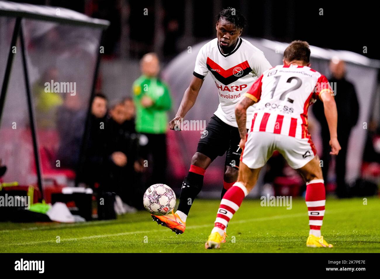 ALMERE, NETHERLANDS - OCTOBER 18: Anthony Limbombe of Almere City FC, Dean van der Sluys of TOP Oss during the Dutch TOTO KNVB Cup match between Almere City FC and TOP Oss at Yanmar Stadion on October 18, 2022 in Almere, Netherlands (Photo by Patrick Goosen/Orange Pictures) Stock Photo