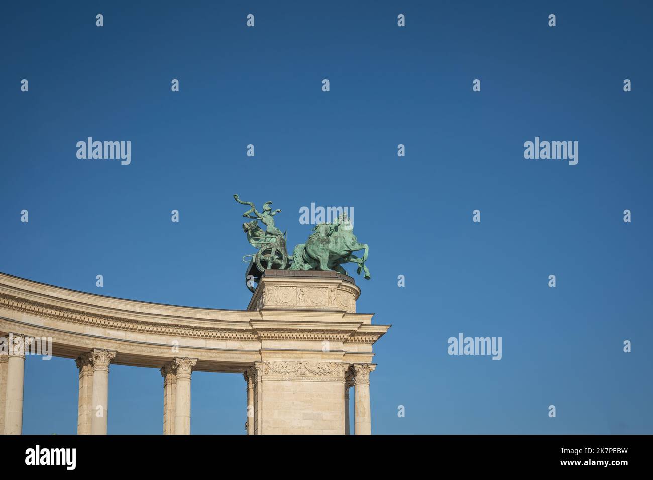 Charioteer with a snake sculpture symbolising War on top of Left Colonnade of the Millennium Monument at Heroes Square - Budapest, Hungary Stock Photo