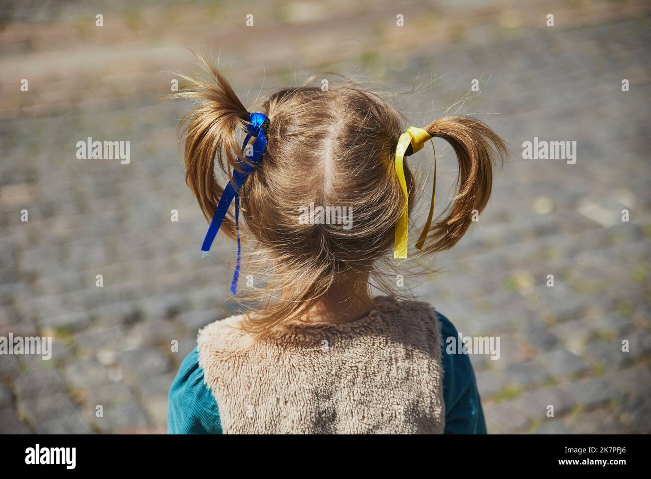 charming child with Ukrainian ribbons in her hair Stock Photo Alamy