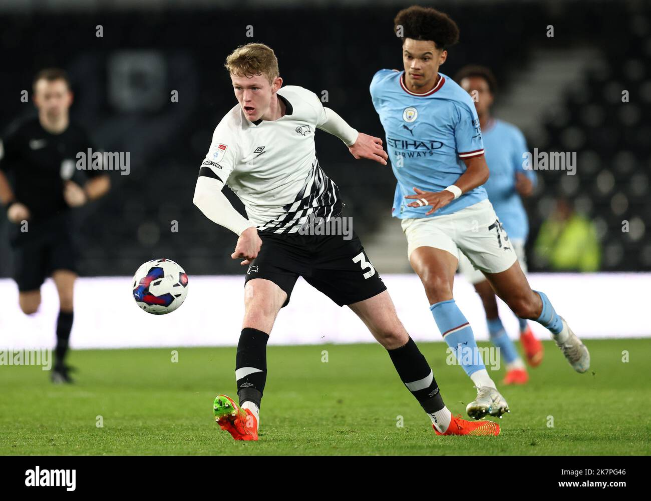 Derby, England, 18th October 2022.  Nico OÕReilly of Manchester City challenges Jack Rooney (L) of Derby County during the Papa Johns Trophy match at Pride Park Stadium, Derby. Picture credit should read: Darren Staples / Sportimage Stock Photo
