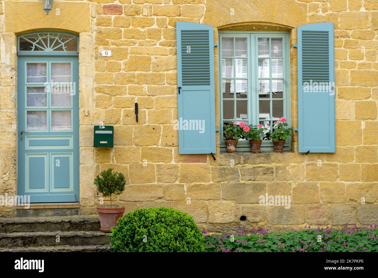 Facade of old building of typical French architecture Stock Photo