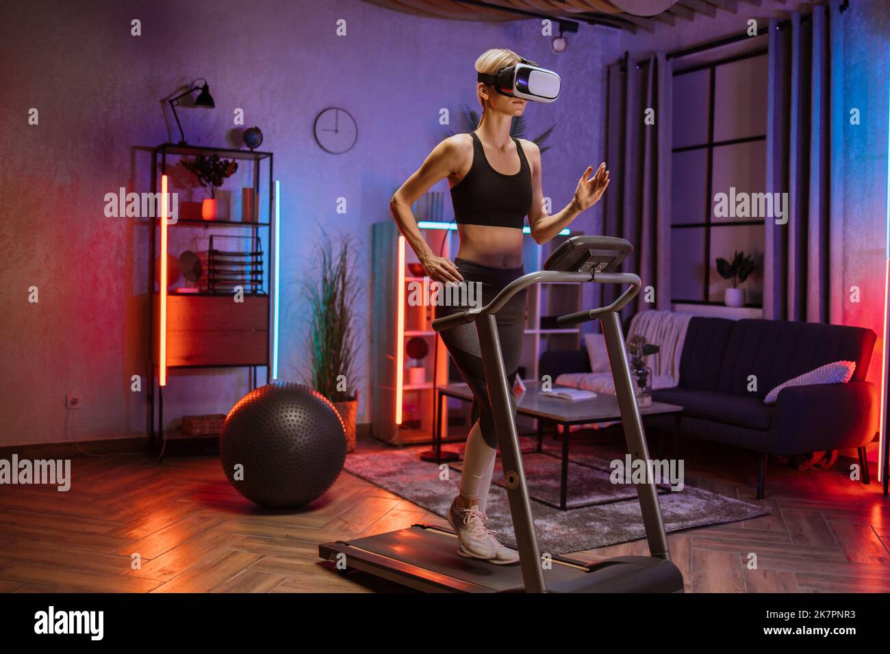 Attractive young sports caucasian woman doing fitness exercise, running