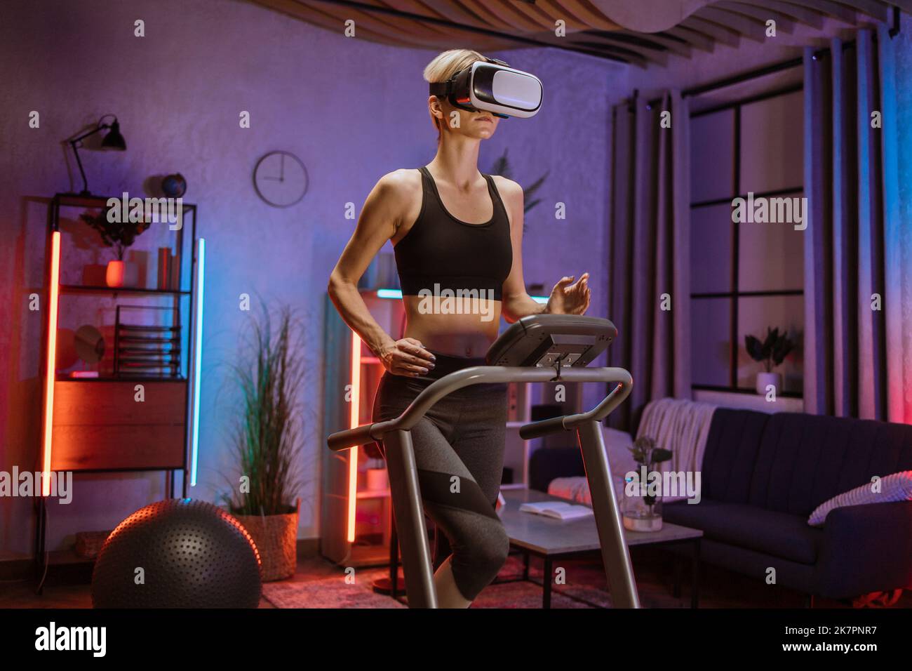 Attractive young sports caucasian woman doing fitness exercise, running