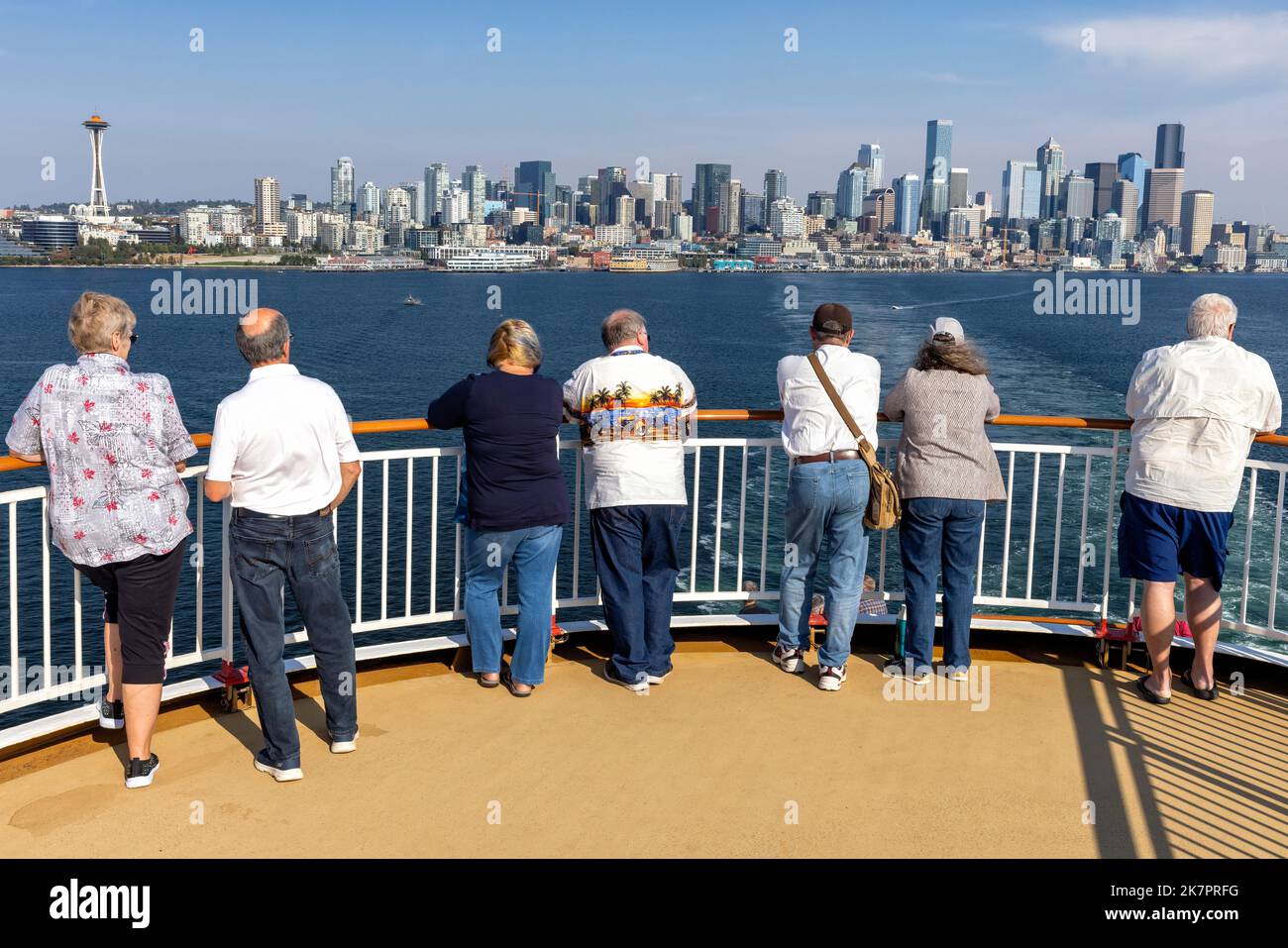 Tourists on a cruise ship looking out at downtown Seattle skyline - Seattle, Washington, USA Stock Photo
