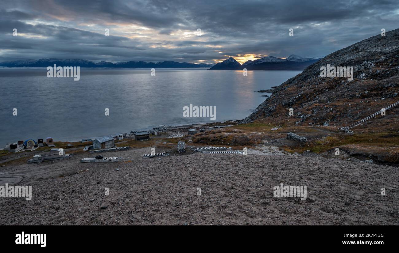 The Arctic Ocean and the Byam Martin Mountains with sleds and huts on ...
