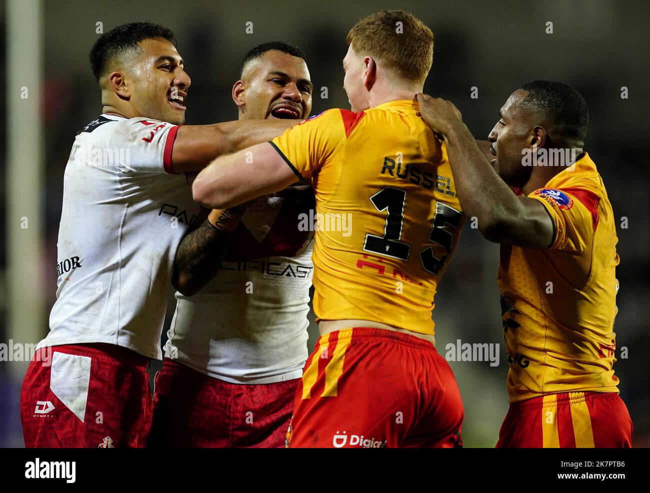 Tonga’s Will Penisini tussles with apua New Guinea’s Daniel Russell