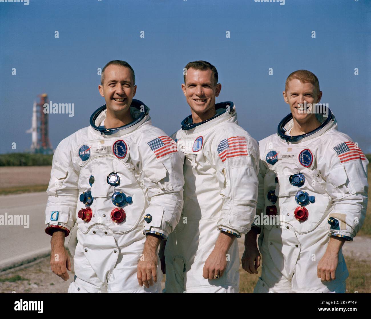 Cape Canaveral, United States. 18th Oct, 2022. NASA Apollo 9 prime crew astronauts, left to right, James McDivitt, David Scott, and Russell Schweickart pose by the Saturn V rocket on Launch Pad 39A at the Kennedy Space Center, December 18, 1968 in Cape Canaveral, Florida. McDivitt commanded the first Gemini spacewalk mission and commanded Apollo 9 during the first crewed orbital flight of a the lunar module, died October 15, 2022 at age 93. Credit: NASA/NASA/Alamy Live News Stock Photo