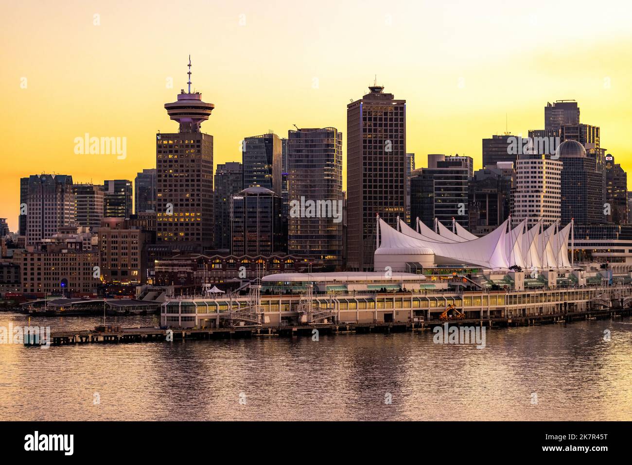 View of Canada Place and downtown Vancouver's skyline at sunset - Vancouver, British Columbia, Canada Stock Photo