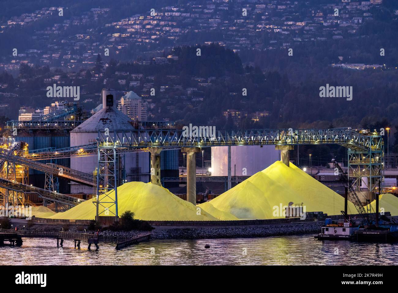 Piles of yellow sulfur at the North Vancouver Sulfur Works - North Vancouver, British Columbia, Canada Stock Photo