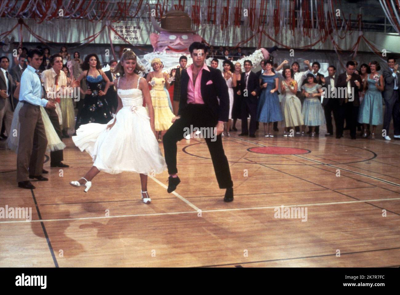Olivia Newton-John & John Travolta  Film Grease (USA 1978) Characters: Sandy Olsson, Danny Zuko  Director: Randal Kleiser 13 June 1978   **WARNING** This Photograph is for editorial use only and is the copyright of PARAMOUNT PICTURES and/or the Photographer assigned by the  Film or Production Company and can only be reproduced by publications in conjunction with the promotion of the above  Film. A Mandatory Credit To PARAMOUNT PICTURES is required. The Photographer should also be credited when known. No commercial use can be granted without written authority from the  Film Company. Stock Photo