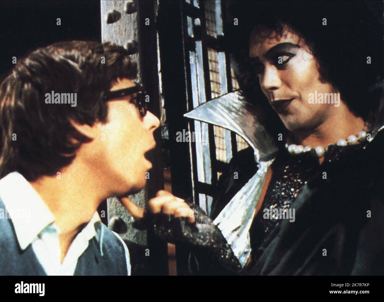 Barry Bostwick & Tim Curry Film: The Rocky Horror Picture Show (UK/USA 1975) Characters: Brad Majors - A Hero, Dr. Frank-N-Furter - A Scientist  Director: Jim Sharman 14 August 1975   **WARNING** This Photograph is for editorial use only and is the copyright of 20TH CENTURY FOX and/or the Photographer assigned by the Film or Production Company and can only be reproduced by publications in conjunction with the promotion of the above Film. A Mandatory Credit To 20TH CENTURY FOX is required. The Photographer should also be credited when known. No commercial use can be granted without written auth Stock Photo