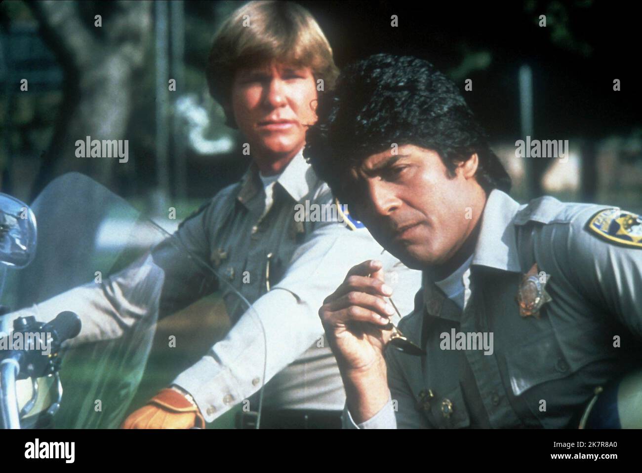 Larry Wilcox & Erik Estrada Television: Chips (1977) Characters: Officer Jon Baker, Officer Francis Llewellyn 'Ponch' Poncherello  15 September 1977   **WARNING** This Photograph is for editorial use only and is the copyright of MGM TV and/or the Photographer assigned by the Film or Production Company and can only be reproduced by publications in conjunction with the promotion of the above Film. A Mandatory Credit To MGM TV is required. The Photographer should also be credited when known. No commercial use can be granted without written authority from the Film Company. Stock Photo
