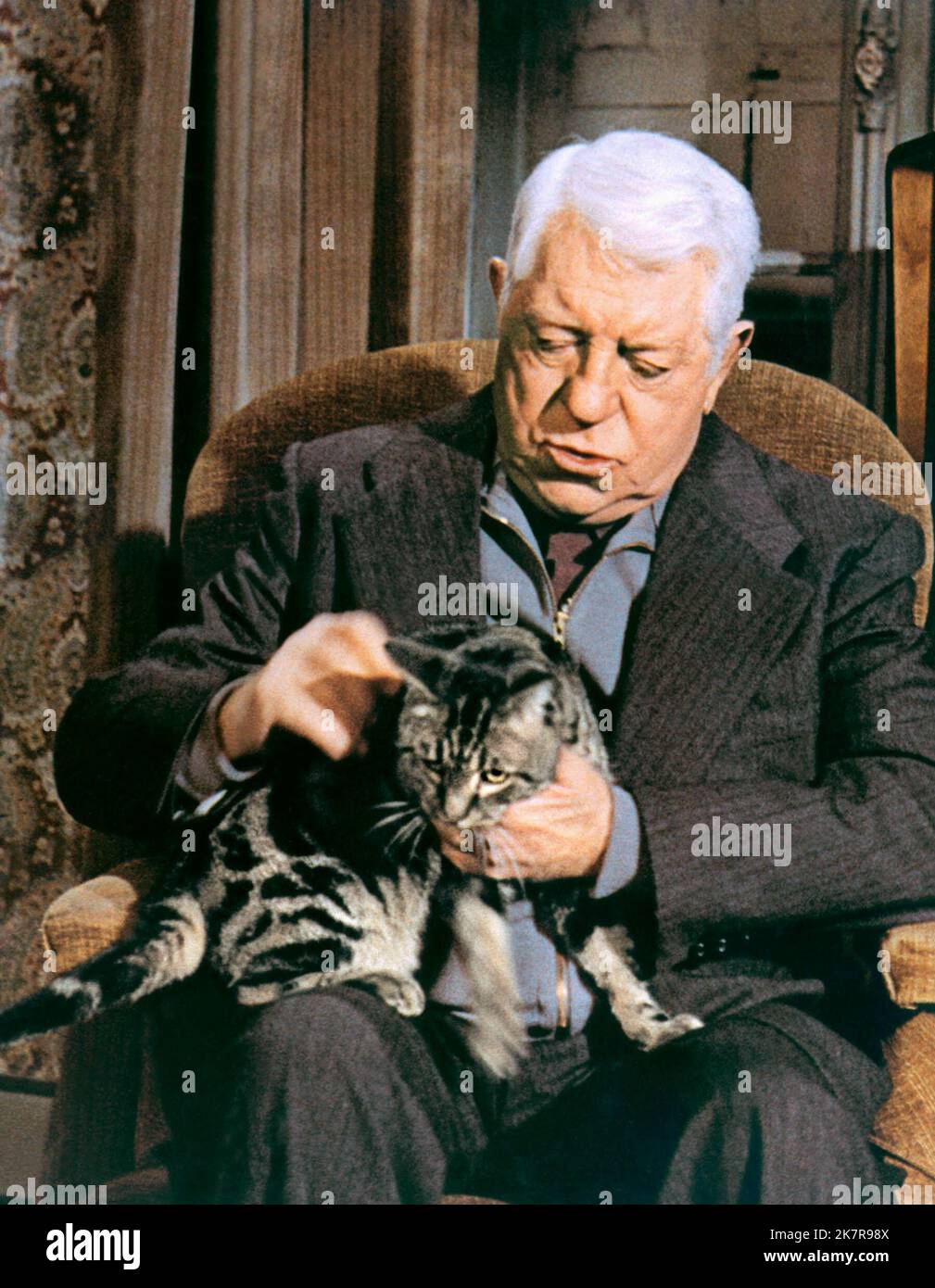 Jean Gabin & Cat Film: The Cat (1971)   Director: Pierre Granier-Deferre 24 April 1971   **WARNING** This Photograph is for editorial use only and is the copyright of CINETEL and/or the Photographer assigned by the Film or Production Company and can only be reproduced by publications in conjunction with the promotion of the above Film. A Mandatory Credit To CINETEL is required. The Photographer should also be credited when known. No commercial use can be granted without written authority from the Film Company. Stock Photo