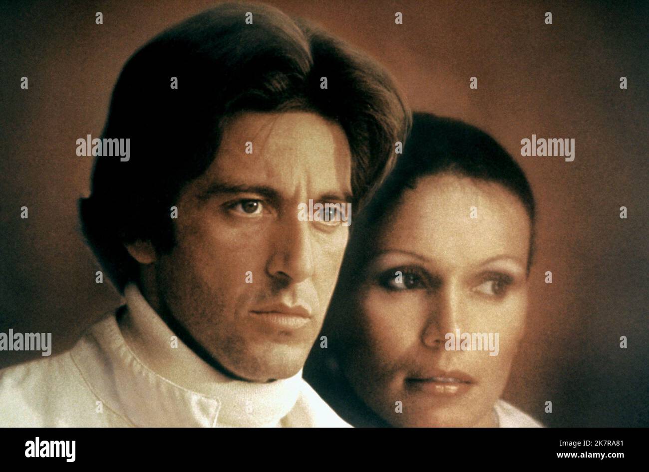 Al Pacino & Marthe Keller Film: Bobby Deerfield (1970) Characters: Bobby Deerfield & Lillian Morelli  Director: Sydney Pollack 17 September 1977   **WARNING** This Photograph is for editorial use only and is the copyright of COLUMBIA and/or the Photographer assigned by the Film or Production Company and can only be reproduced by publications in conjunction with the promotion of the above Film. A Mandatory Credit To COLUMBIA is required. The Photographer should also be credited when known. No commercial use can be granted without written authority from the Film Company. Stock Photo