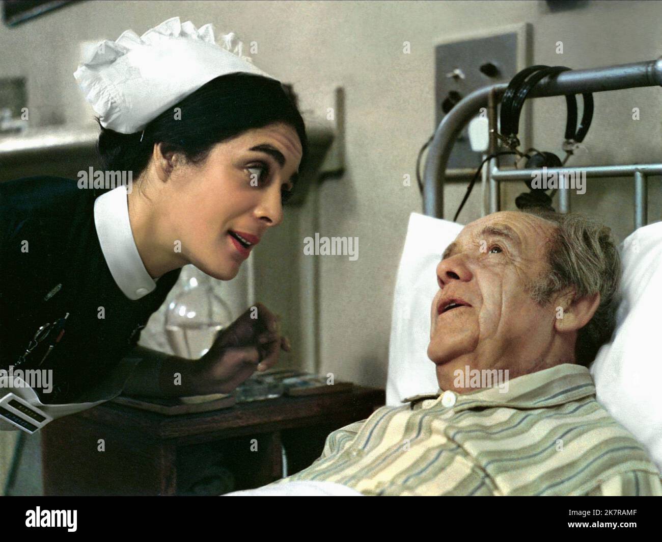 Eleanor Bron & Mervyn Johns Film: The National Health (1974) Characters: Sister McFee / Sister Mary MacArthur & Rees  Director: Jack Gold 01 June 1973   **WARNING** This Photograph is for editorial use only and is the copyright of COLUMBIA and/or the Photographer assigned by the Film or Production Company and can only be reproduced by publications in conjunction with the promotion of the above Film. A Mandatory Credit To COLUMBIA is required. The Photographer should also be credited when known. No commercial use can be granted without written authority from the Film Company. Stock Photo