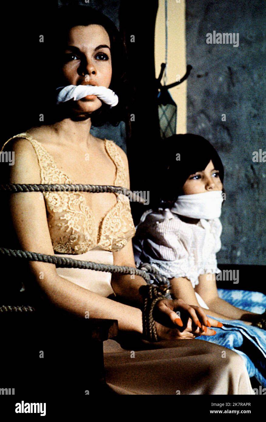 Genevieve Bujold, Wanda Blackman Film: Obsession (1976) Characters: ,Amy Courtland  Director: Brian De Palma 01 August 1976   **WARNING** This Photograph is for editorial use only and is the copyright of COLUMBIA and/or the Photographer assigned by the Film or Production Company and can only be reproduced by publications in conjunction with the promotion of the above Film. A Mandatory Credit To COLUMBIA is required. The Photographer should also be credited when known. No commercial use can be granted without written authority from the Film Company. Stock Photo