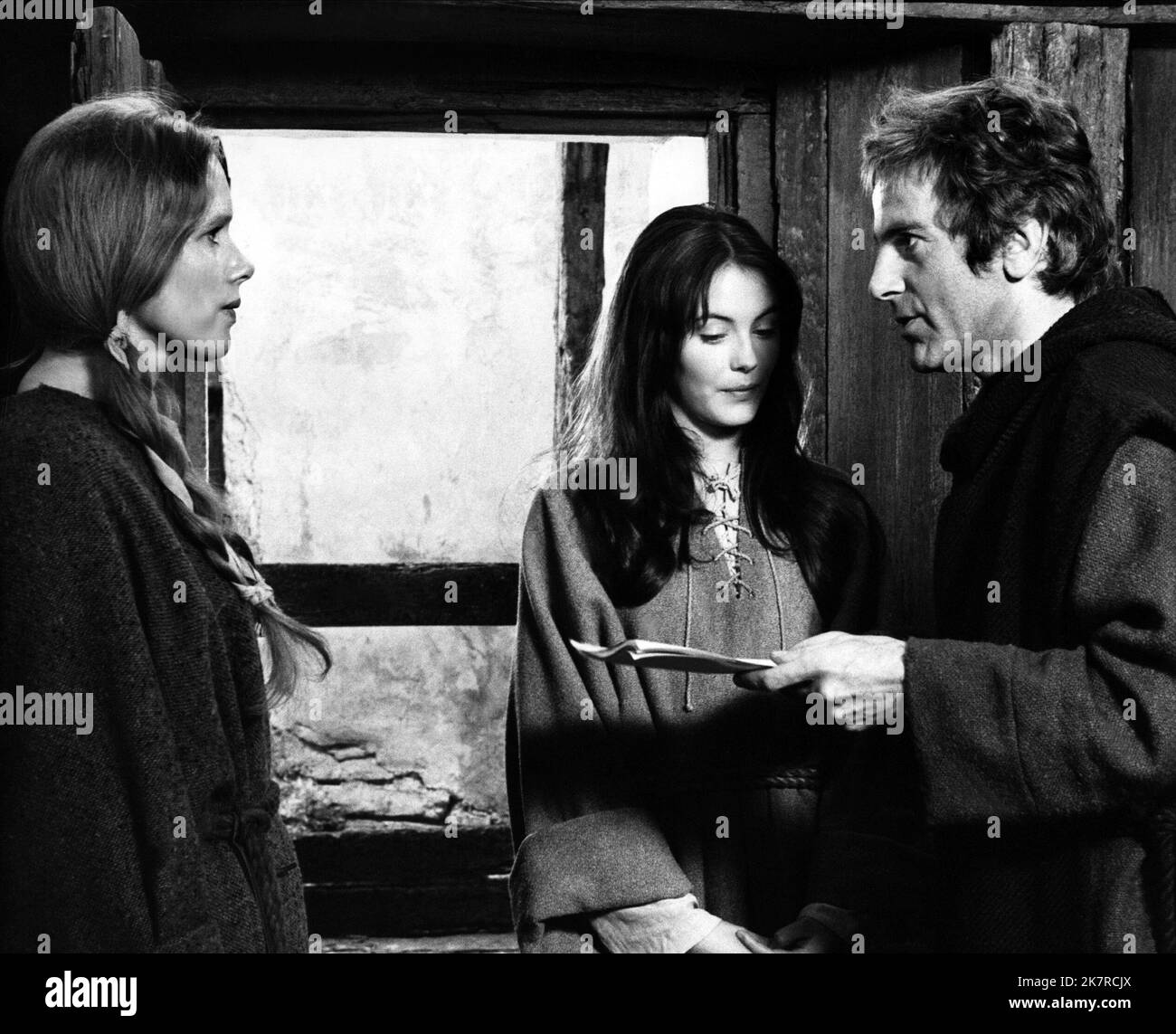 Liv Ullmann, Lesley-Anne Down & Maximilian Schell Film: Pope Joan; The Devil'S Imposter (UK 1972) Characters: Pope Joan, Cecilia, Adrian  Director: Michael Anderson 16 August 1972   **WARNING** This Photograph is for editorial use only and is the copyright of ROADSHOW PRODUCTIONS and/or the Photographer assigned by the Film or Production Company and can only be reproduced by publications in conjunction with the promotion of the above Film. A Mandatory Credit To ROADSHOW PRODUCTIONS is required. The Photographer should also be credited when known. No commercial use can be granted without writte Stock Photo