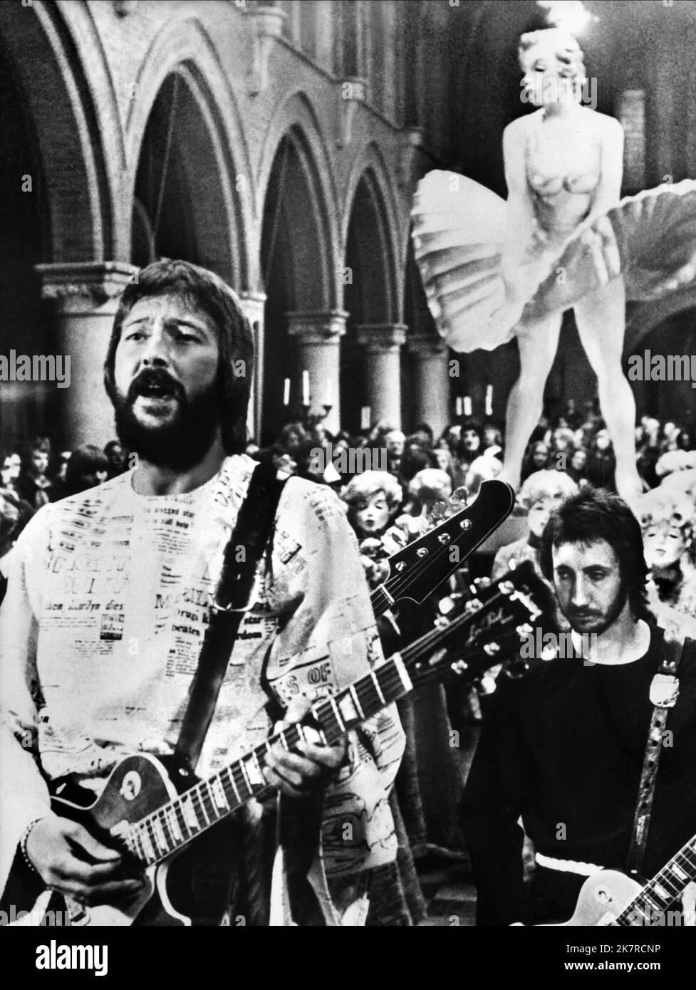 Eric Clapton & Pete Townshend Film: Tommy (UK 1975) Characters: The Preacher, Himself  Director: Ken Russell 19 March 1975   **WARNING** This Photograph is for editorial use only and is the copyright of HEMDALE and/or the Photographer assigned by the Film or Production Company and can only be reproduced by publications in conjunction with the promotion of the above Film. A Mandatory Credit To HEMDALE is required. The Photographer should also be credited when known. No commercial use can be granted without written authority from the Film Company. Stock Photo