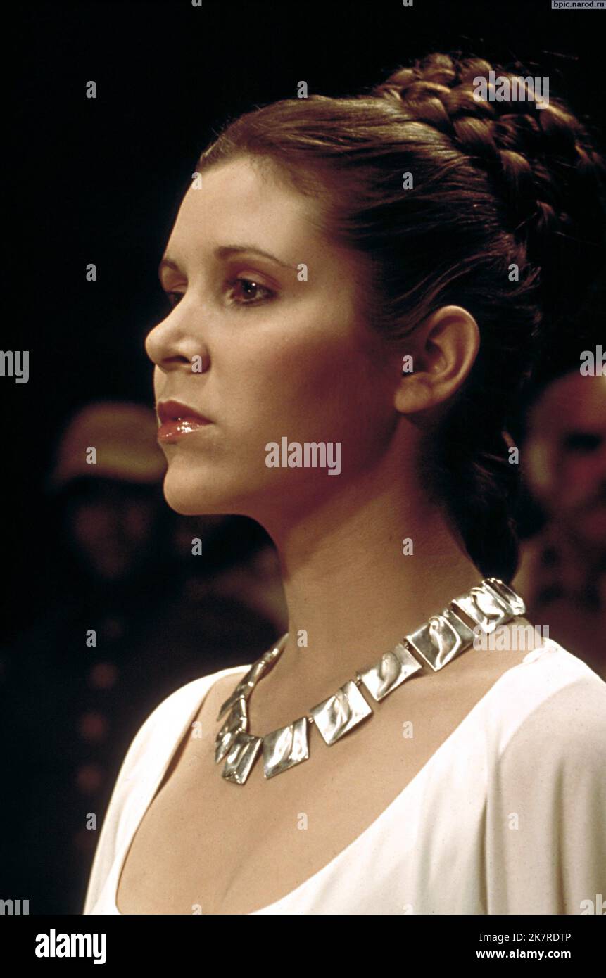 Carrie Fisher Film: Star Wars: Episode Iv - A New Hope (USA 1977) Characters: Princess Leia Organa  / Neuer Titel Auch: 'Star Wars: Episode Iv – Eine Neue Hoffnung' Director: George Lucas 25 May 1977   **WARNING** This Photograph is for editorial use only and is the copyright of LUCASFILM and/or the Photographer assigned by the Film or Production Company and can only be reproduced by publications in conjunction with the promotion of the above Film. A Mandatory Credit To LUCASFILM is required. The Photographer should also be credited when known. No commercial use can be granted without written Stock Photo