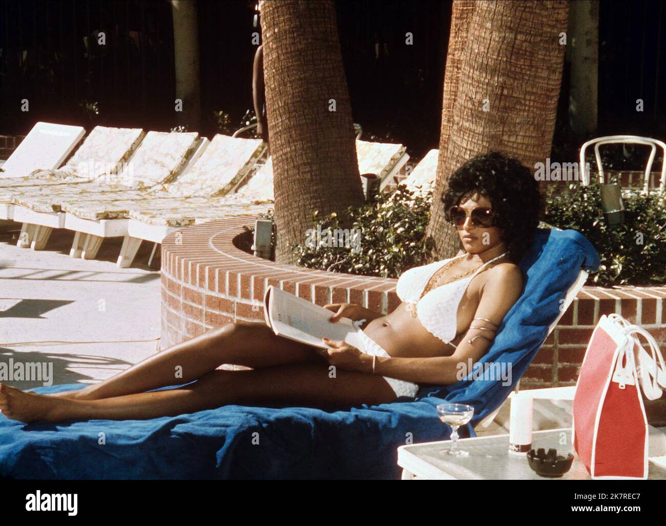 Pam Grier Film: Coffy (1978) Characters: Coffy  Director: Jack Hill 13 June 1973   **WARNING** This Photograph is for editorial use only and is the copyright of AMERICAN INTERNATIONAL PICTURES and/or the Photographer assigned by the Film or Production Company and can only be reproduced by publications in conjunction with the promotion of the above Film. A Mandatory Credit To AMERICAN INTERNATIONAL PICTURES is required. The Photographer should also be credited when known. No commercial use can be granted without written authority from the Film Company. Stock Photo