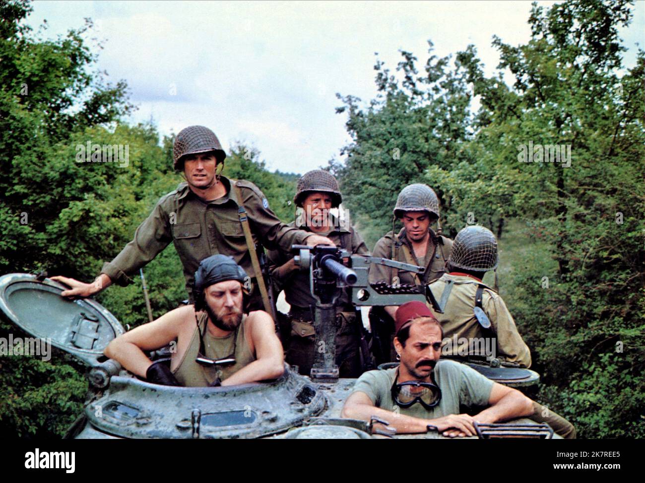 Clint Eastwood, Donald Sutherland & Don Rickles Film: Kelly'S Heroes (USA/YU 1970) Characters: Pvt. Kelly, Sgt. Oddball (tank commander), SSgt. Crapgame  Director: Brian G.Hutton 23 June 1970   **WARNING** This Photograph is for editorial use only and is the copyright of MGM and/or the Photographer assigned by the Film or Production Company and can only be reproduced by publications in conjunction with the promotion of the above Film. A Mandatory Credit To MGM is required. The Photographer should also be credited when known. No commercial use can be granted without written authority from the F Stock Photo