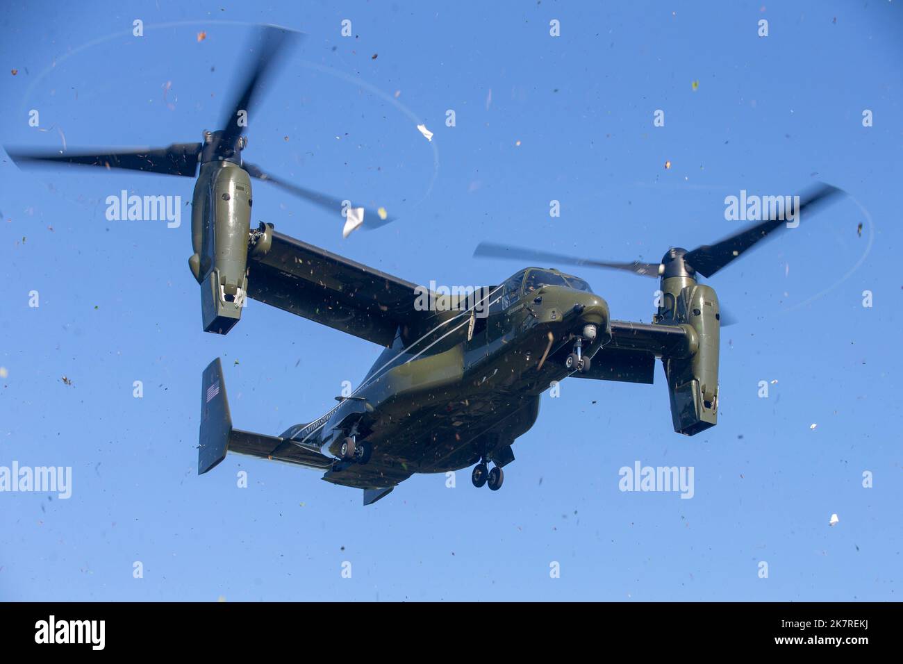 A VM-22 Osprey flies overhead for a leaflet drop during the Information Warfighter Exercise (IWX) at Camp Upshur, VA, Sept. 16, 2022. The IWX is a training event that focuses on implementing all Information Related Capability requirements with the joint force, government agencies and partnering nations that provides accurate subject matter expertise to all Marine Corps operations. (Official U.S. Marine Corps photo taken by Cpl. Eric Hunyh) Stock Photo