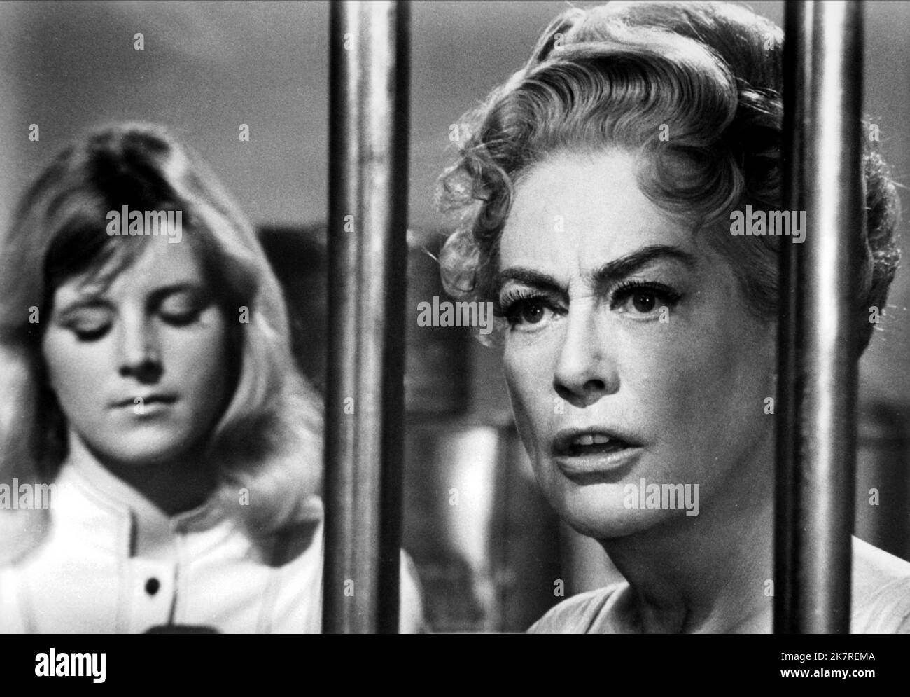 Kim Braden & Joan Crawford Film: Trog (1977) Characters: Anne Brockton, Dr. Brockton  Director: Freddie Francis 01 September 1970   **WARNING** This Photograph is for editorial use only and is the copyright of WARNER BROS. and/or the Photographer assigned by the Film or Production Company and can only be reproduced by publications in conjunction with the promotion of the above Film. A Mandatory Credit To WARNER BROS. is required. The Photographer should also be credited when known. No commercial use can be granted without written authority from the Film Company. Stock Photo