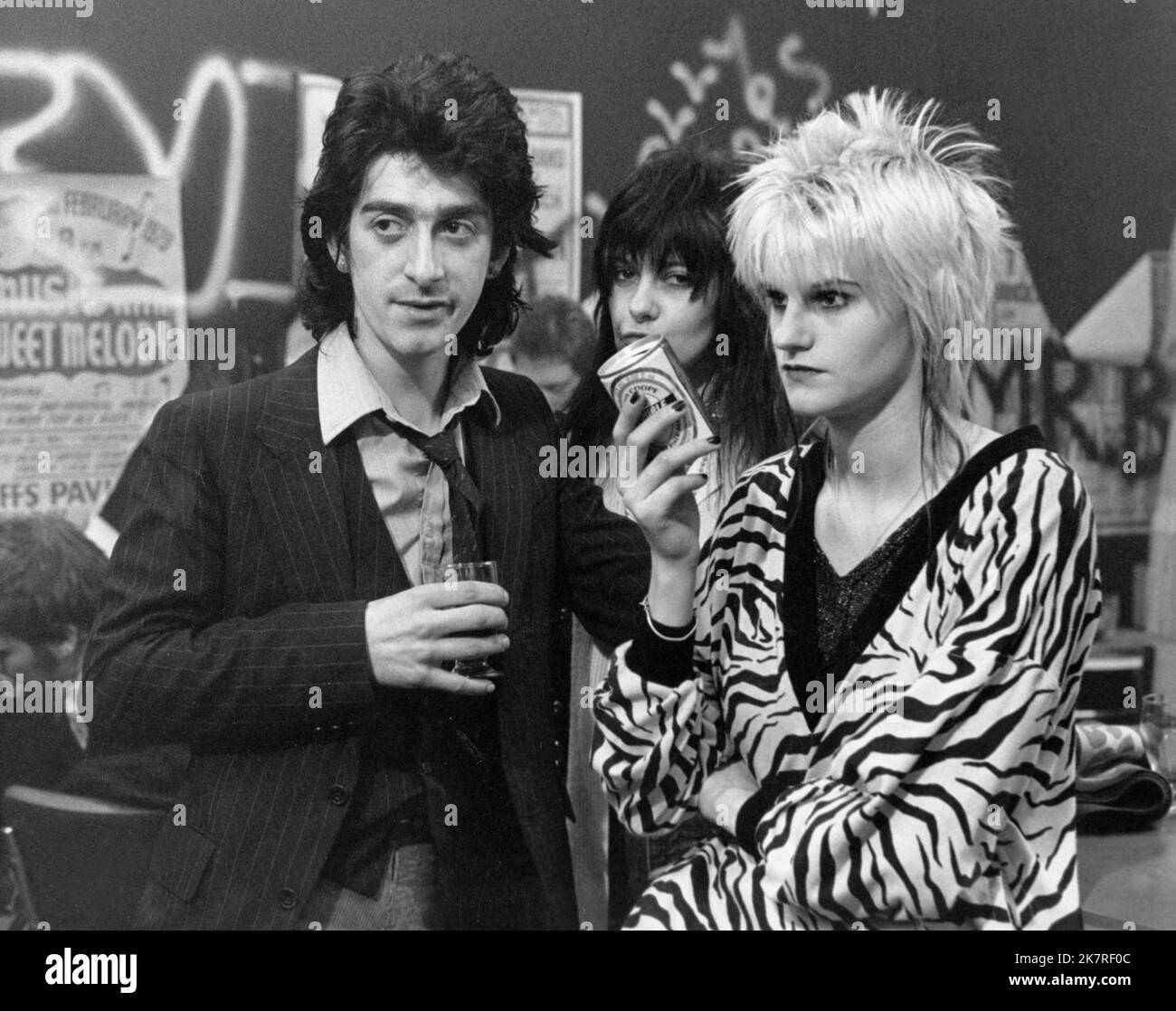 Gary Holton, Sally James & Gwyneth Strong Film: Bloody Kids (1975) Characters: Ken, & Jan, Ken's Girlfriend  Director: Stephen Frears 01 December 1979   **WARNING** This Photograph is for editorial use only and is the copyright of BLACK LION FILMS LIMITED and/or the Photographer assigned by the Film or Production Company and can only be reproduced by publications in conjunction with the promotion of the above Film. A Mandatory Credit To BLACK LION FILMS LIMITED is required. The Photographer should also be credited when known. No commercial use can be granted without written authority from the Stock Photo