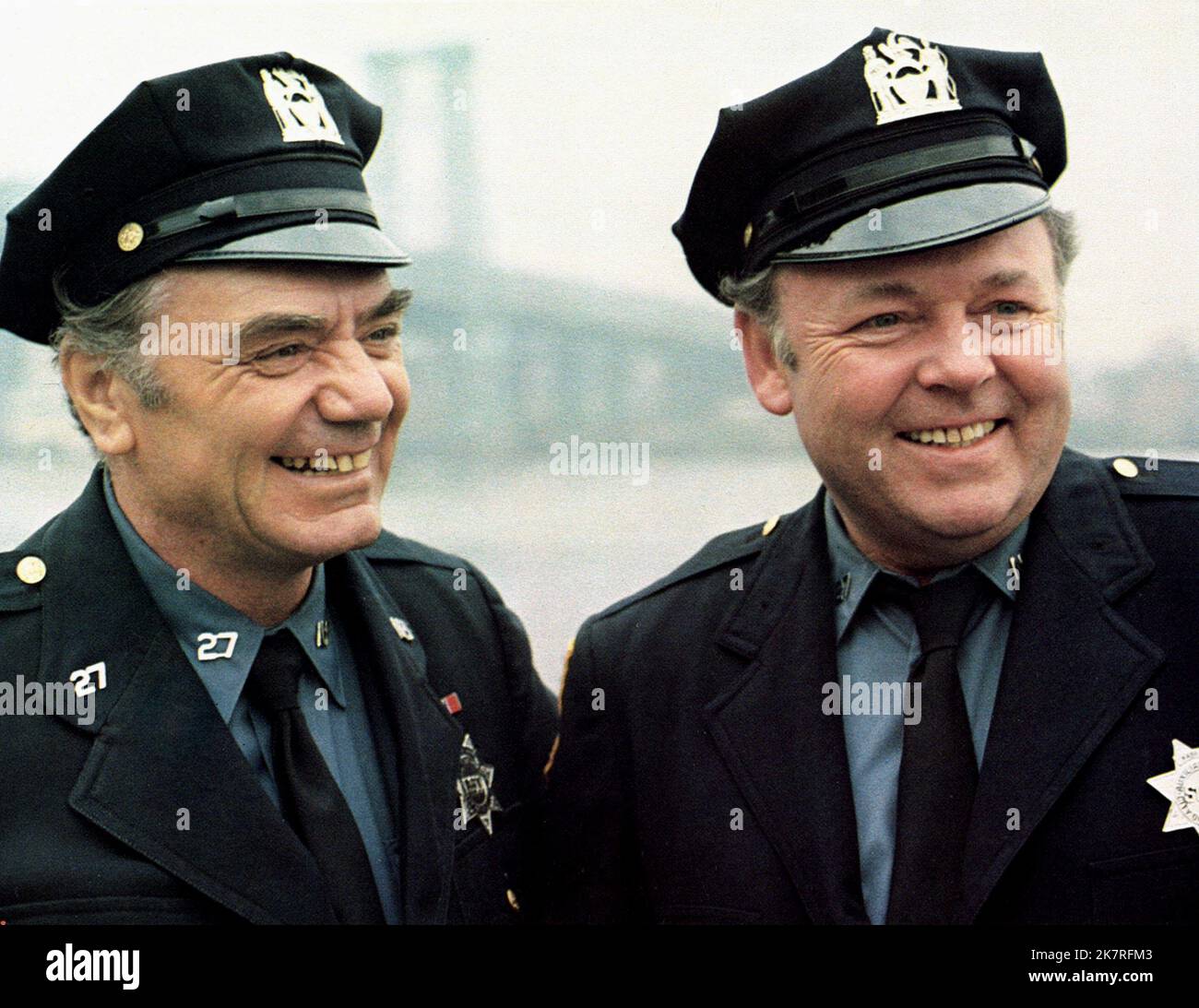 Ernest Borgnine & Carroll O'Connor Film: Law And Disorder (1974) Characters: Cy &  Director: Ivan Passer 09 October 1974   **WARNING** This Photograph is for editorial use only and is the copyright of The Film Company and/or the Photographer assigned by the Film or Production Company and can only be reproduced by publications in conjunction with the promotion of the above Film. A Mandatory Credit To The Film Company is required. The Photographer should also be credited when known. No commercial use can be granted without written authority from the Film Company. Stock Photo