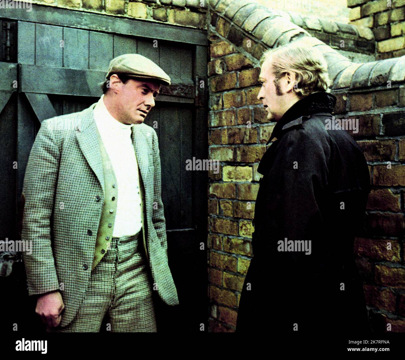 Glynn Edwards & Michael Caine Film: Get Carter (1971) Characters: Albert & Jack Carter  Director: Mike Hodges 03 March 1971   **WARNING** This Photograph is for editorial use only and is the copyright of METRO and/or the Photographer assigned by the Film or Production Company and can only be reproduced by publications in conjunction with the promotion of the above Film. A Mandatory Credit To METRO is required. The Photographer should also be credited when known. No commercial use can be granted without written authority from the Film Company. Stock Photo