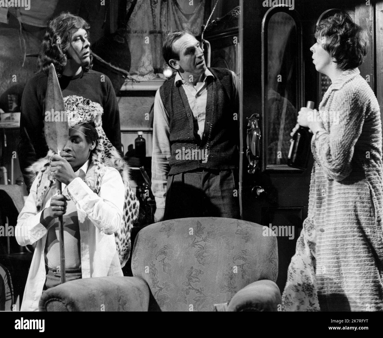 Richard Beckinsale, Leonard Rossiter, Frances De La Tour & Don Warrington Television: Rising Damp (1974) Characters: Alan Moore,Rupert Rigsby,Miss Ruth Jones & Philip Smith  Director: Ronnie Baxter, Veron Lawrence 02 September 1974   **WARNING** This Photograph is for editorial use only and is the copyright of YORKSHIRE TELEVISION and/or the Photographer assigned by the Film or Production Company and can only be reproduced by publications in conjunction with the promotion of the above Film. A Mandatory Credit To YORKSHIRE TELEVISION is required. The Photographer should also be credited when kn Stock Photo