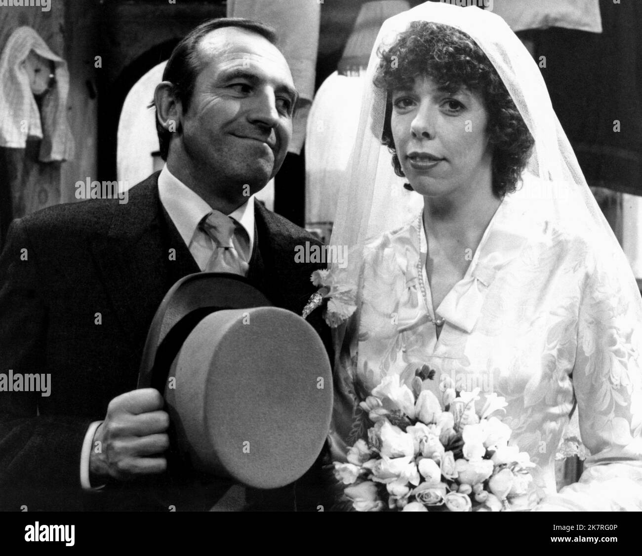 Leonard Rossiter & Frances De La Tour Television: Rising Damp (1979) Characters: Rupert Rigsby & Miss Ruth Jones  Director: Ronnie Baxter, Veron Lawrence 02 September 1974   **WARNING** This Photograph is for editorial use only and is the copyright of YORKSHIRE TELEVISION and/or the Photographer assigned by the Film or Production Company and can only be reproduced by publications in conjunction with the promotion of the above Film. A Mandatory Credit To YORKSHIRE TELEVISION is required. The Photographer should also be credited when known. No commercial use can be granted without written author Stock Photo