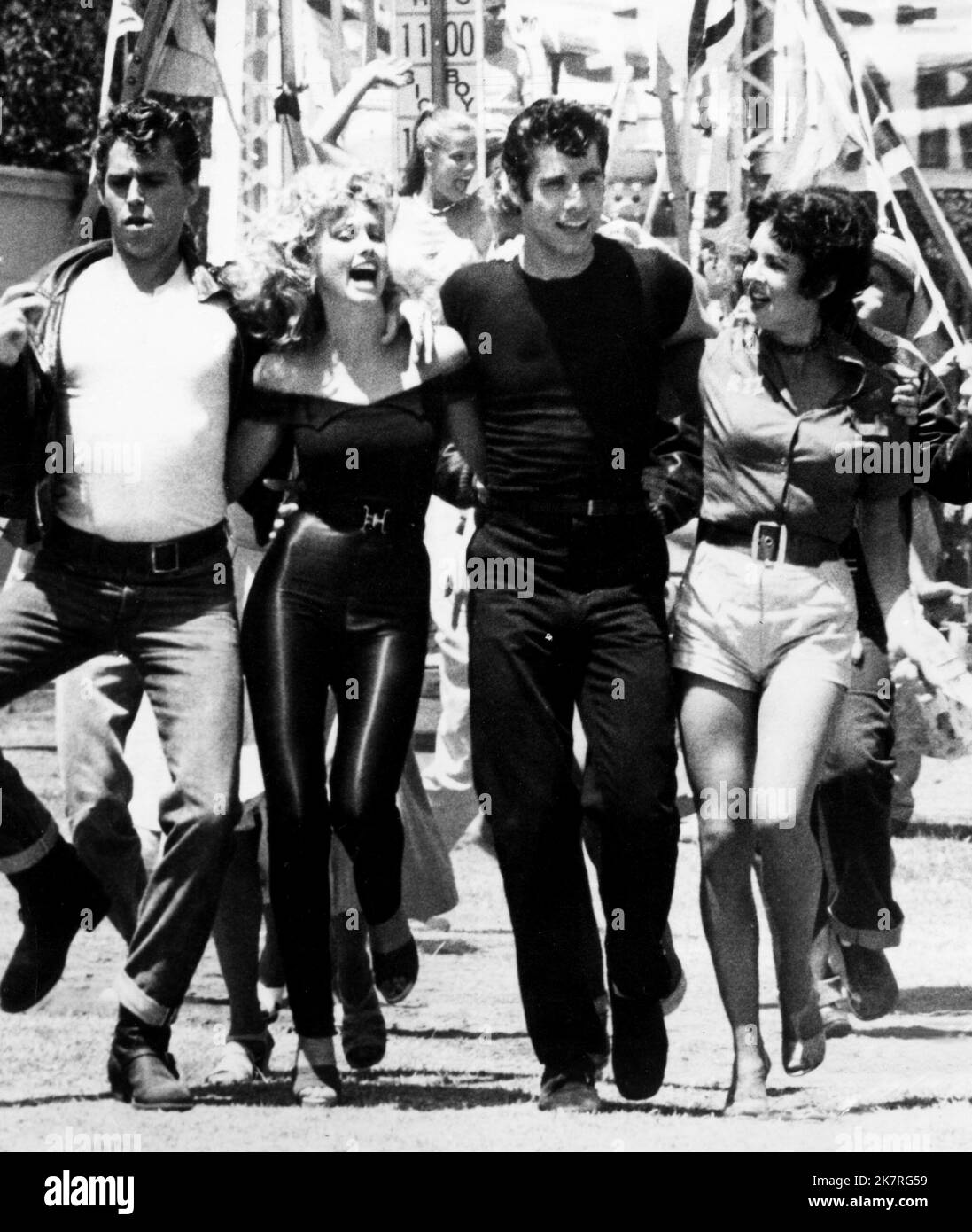 Jeff Conaway, Olivia Newton-John, John Travolta & Stockard Channing Film: Grease (USA 1978) Characters: Kenickie,Sandy Olsson,Danny Zuko & Betty Rizzo  Director: Randal Kleiser 13 June 1978   **WARNING** This Photograph is for editorial use only and is the copyright of PARAMOUNT PICTURES and/or the Photographer assigned by the Film or Production Company and can only be reproduced by publications in conjunction with the promotion of the above Film. A Mandatory Credit To PARAMOUNT PICTURES is required. The Photographer should also be credited when known. No commercial use can be granted without Stock Photo