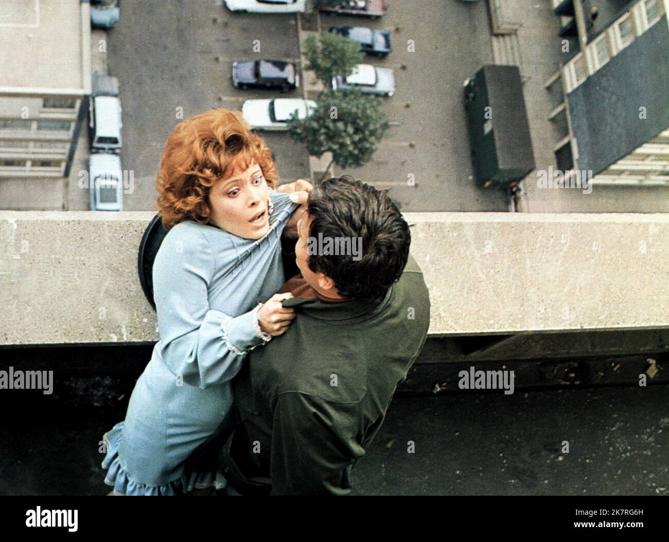 Jill St. John & Oliver Reed Film: Sitting Target (1972) Characters: Pat Lomart & Harry Lomart  Director: Douglas Hickox 01 May 1972   **WARNING** This Photograph is for editorial use only and is the copyright of METRO-GOLDWYN-MAYER and/or the Photographer assigned by the Film or Production Company and can only be reproduced by publications in conjunction with the promotion of the above Film. A Mandatory Credit To METRO-GOLDWYN-MAYER is required. The Photographer should also be credited when known. No commercial use can be granted without written authority from the Film Company. Stock Photo