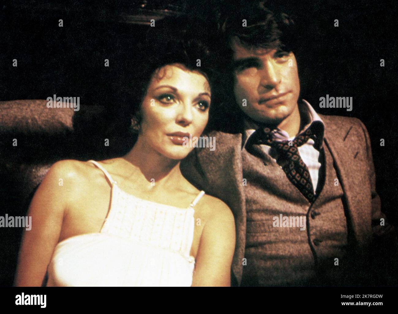 Joan Collins & Oliver Tobias Film: The Stud (UK 1978) Characters: Fontaine Khaled & Tony Blake  Director: Quentin Masters 17 August 1978   **WARNING** This Photograph is for editorial use only and is the copyright of ARTOC FILMS and/or the Photographer assigned by the Film or Production Company and can only be reproduced by publications in conjunction with the promotion of the above Film. A Mandatory Credit To ARTOC FILMS is required. The Photographer should also be credited when known. No commercial use can be granted without written authority from the Film Company. Stock Photo